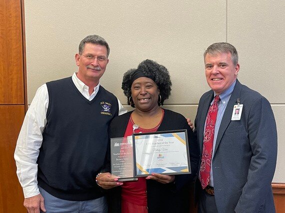 From left to right: Jack Britt High School Principal Scott Pope, Jack Britt High School teacher Betsey Vera and Cumberland County Schools Executive Director of Career and Technical Education Chip Lucas on March 27, 2024. Vera was named the school system's 2024 Career and Technical Education Teacher of the Year.