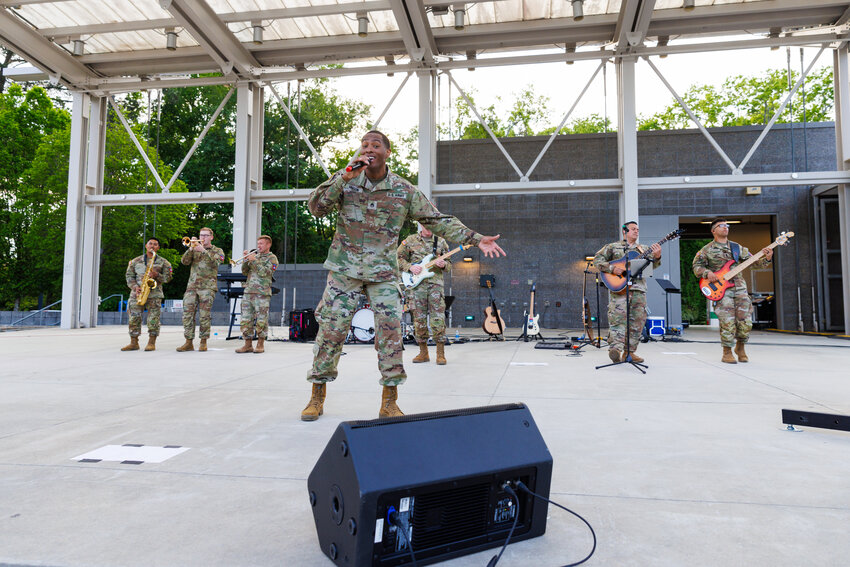 The 82nd Airborne Division All-American Rock Band plays a variety of hits during the 42nd annual Dogwood Festival on Friday, April 26, 2024.