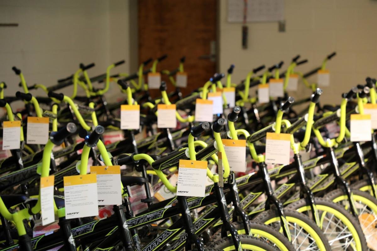 Bicycles fill the stage of the multipurpose room at W.T. Brown Elementary School on Dec. 10.