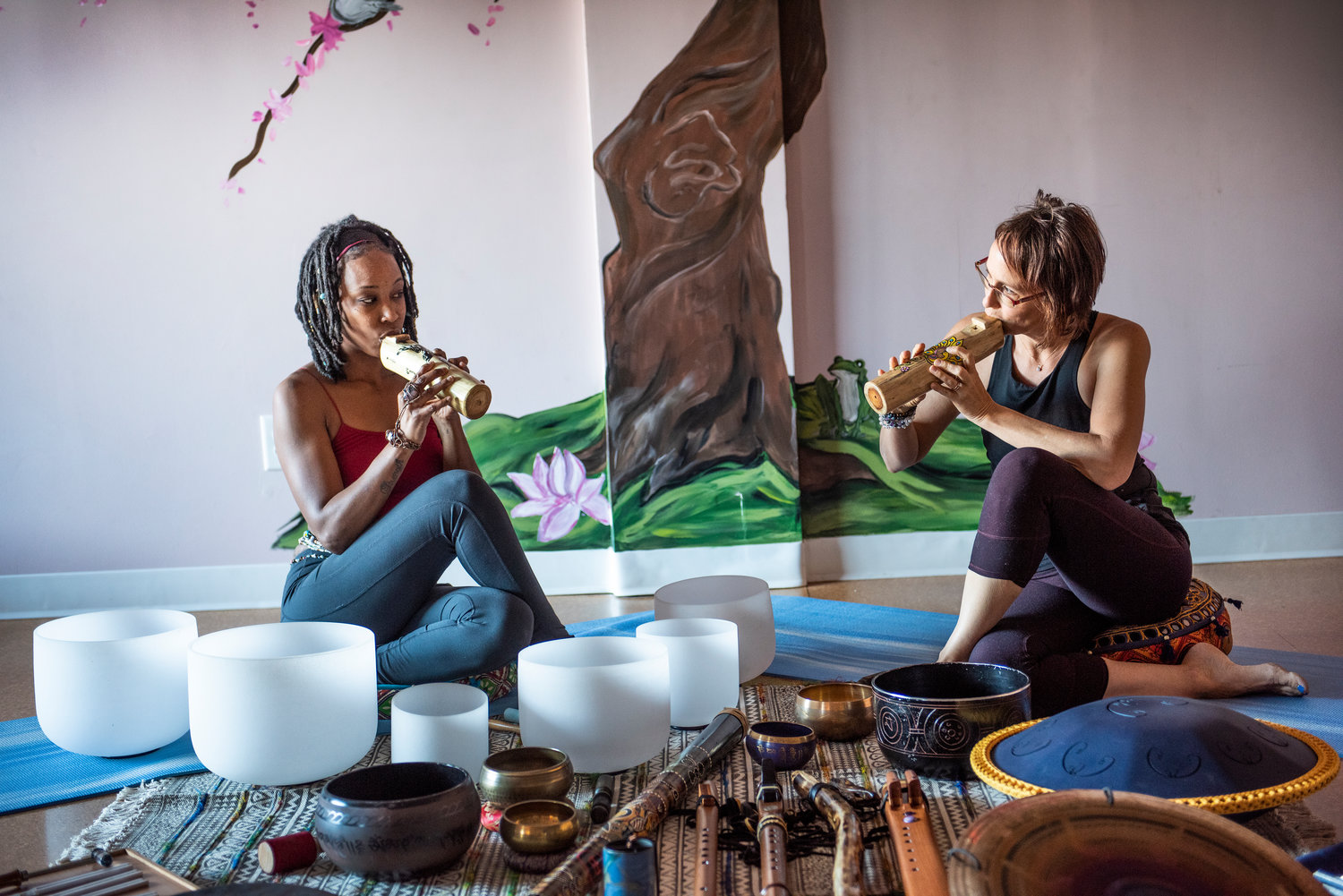 Kalei Phree and Courtney Faiello play the flute during a private Sound Bath at Living Balance Studios.