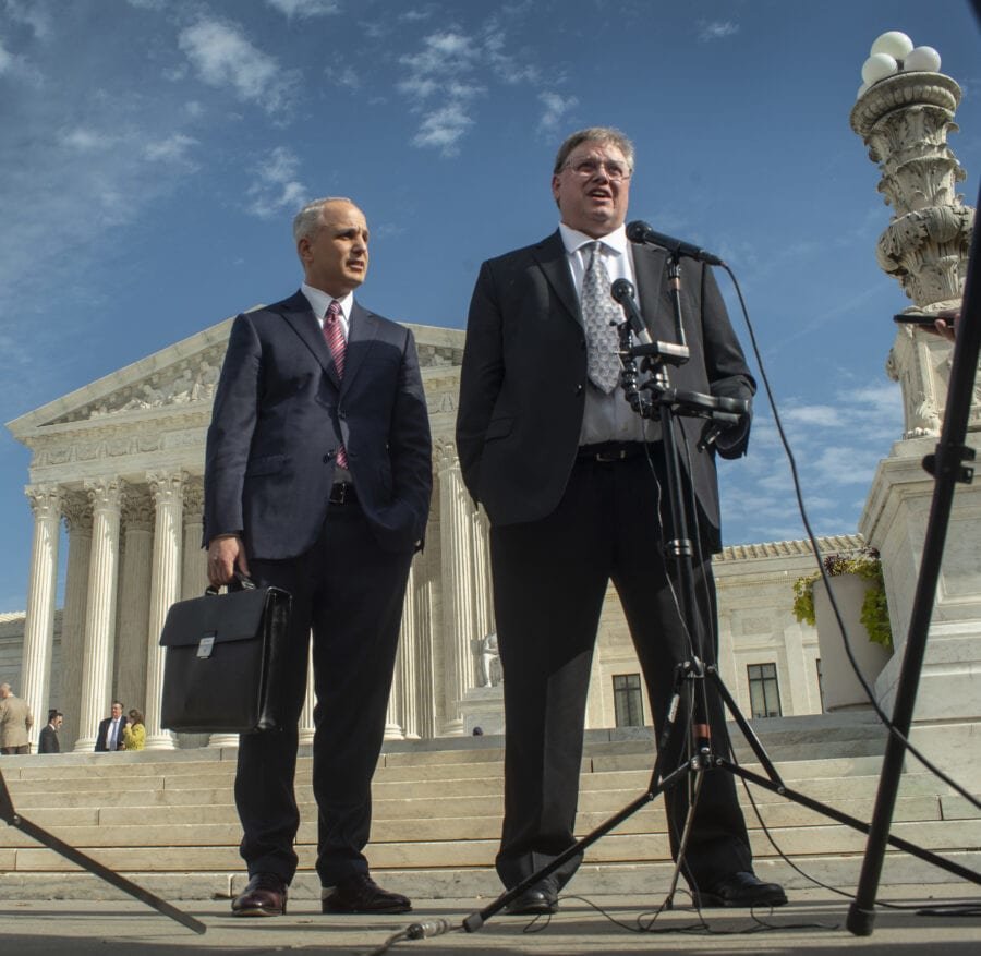 Rick Allen, right, and lawyer Derek Shaffer speak to reporters outside the U.S. Supreme Court after oral arguments in Allen's lawsuit alleging copyright infringement by the state of North Carolina on Nov. 5, 2019.