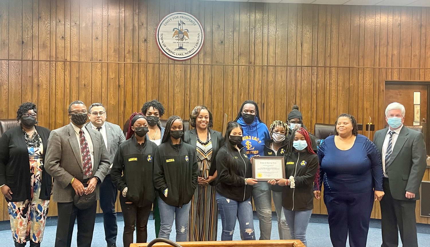 The girls' basketball team at Spring Lake Middle School was recognized Monday night by the Spring Lake Board of Aldermen for winning their Division III Championship.