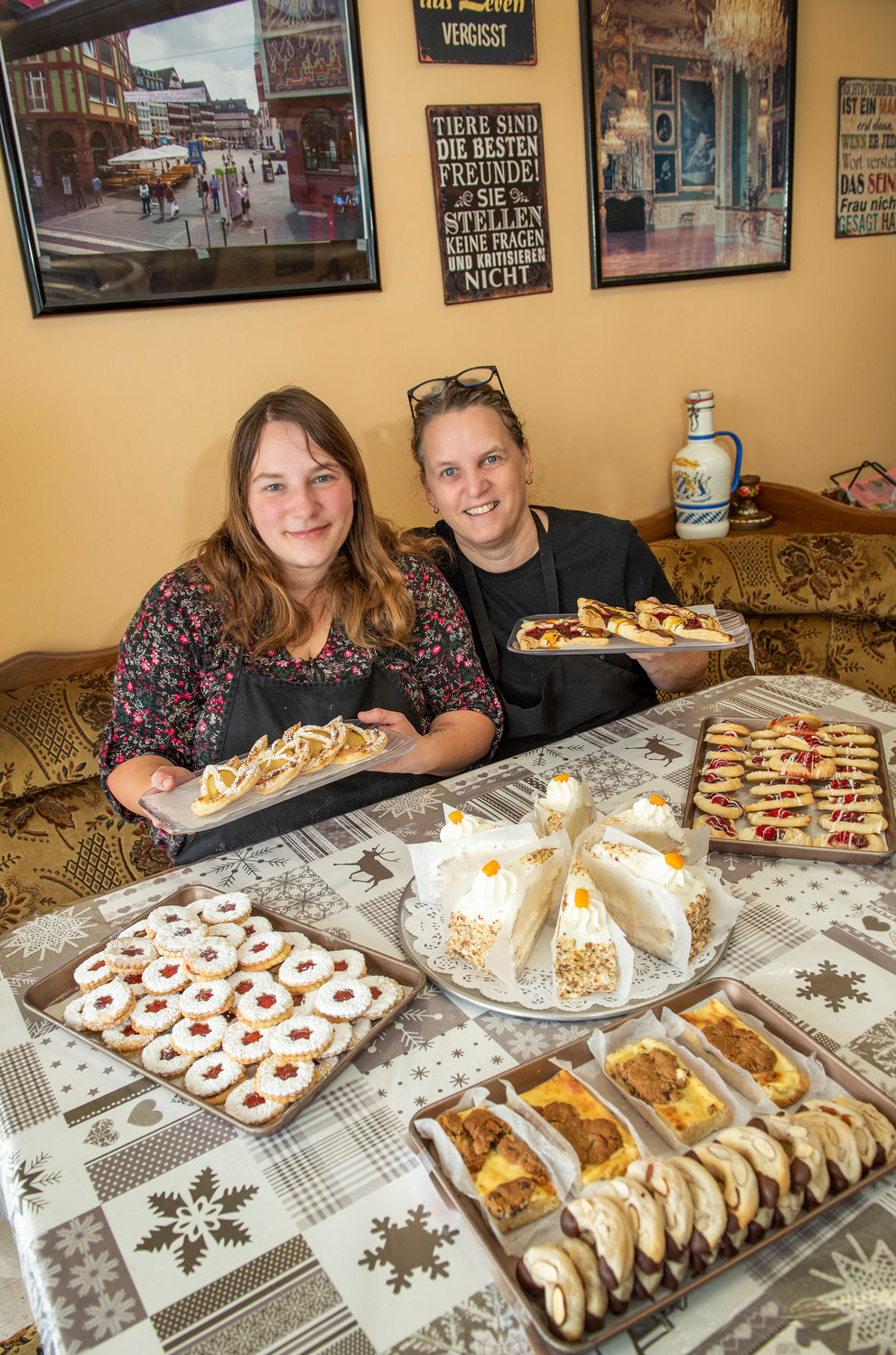 Petra Volcy and her daughter Nadine Dobeneck present authentic German bakery items, including pastries, linzer cookies and slices of German cheesecake.