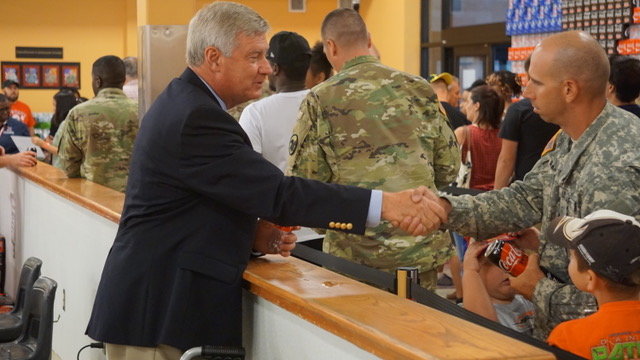 Billy Richardson meets with military families at the Post Exchange on Fort Bragg in 2017.