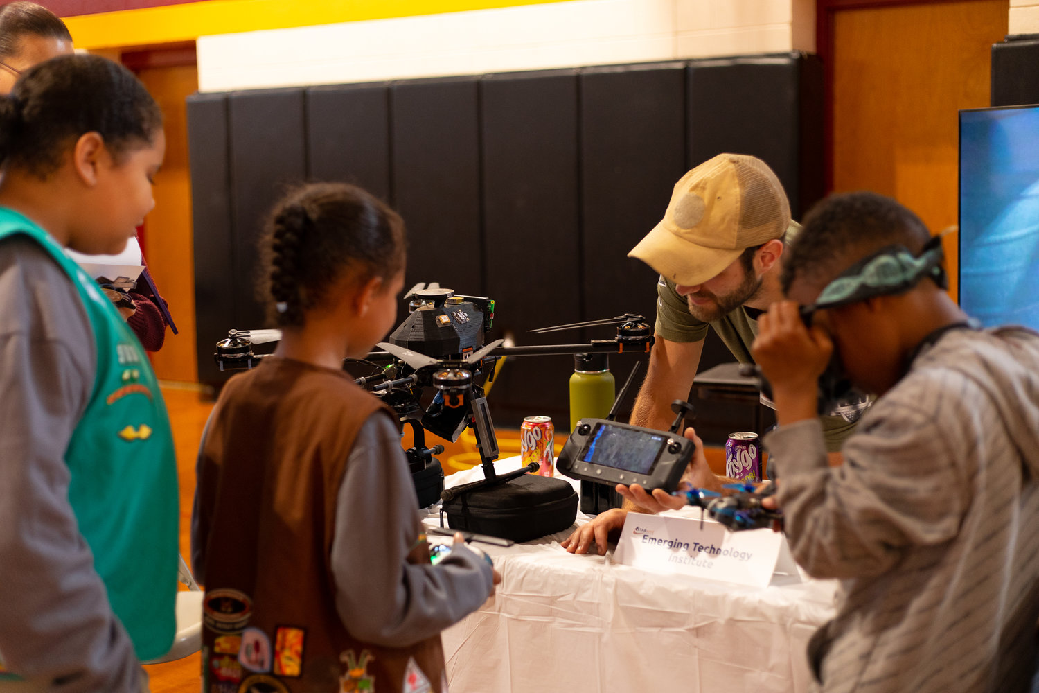 Attendees visit the exhibit booths at the STARward STEM Expo on Tuesday at Douglas Byrd High School.