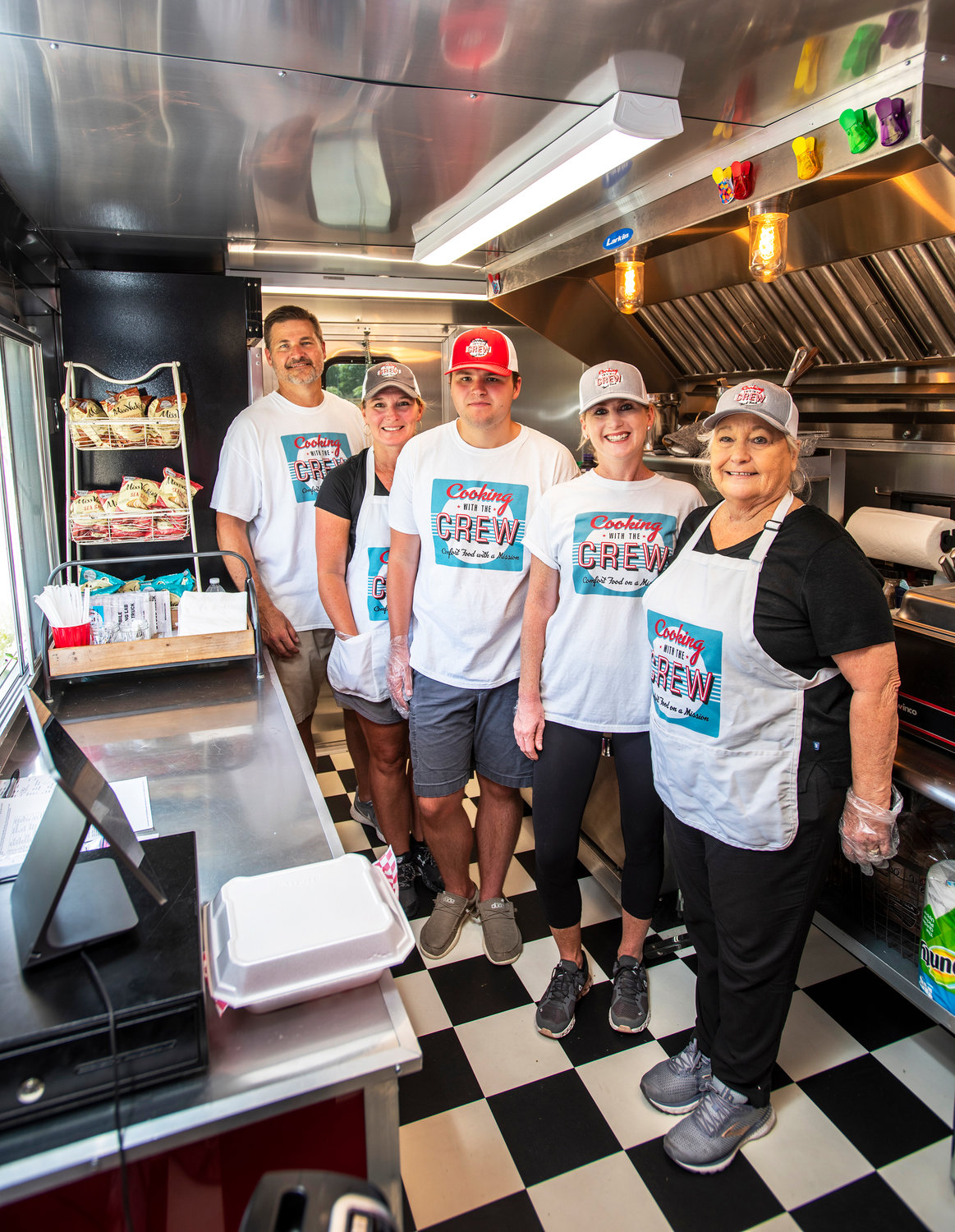 Cooking with the Crew is a mobile training lab, aka food truck. .(L&R) Karl Molnar with his wife Kim and son Miller Molnar, for whom the food truck is named, Karen Horne, Miller's aunt (married to Gary Horne, Kim's brother)and Lisa Horne, Miller's nana (grandmother)