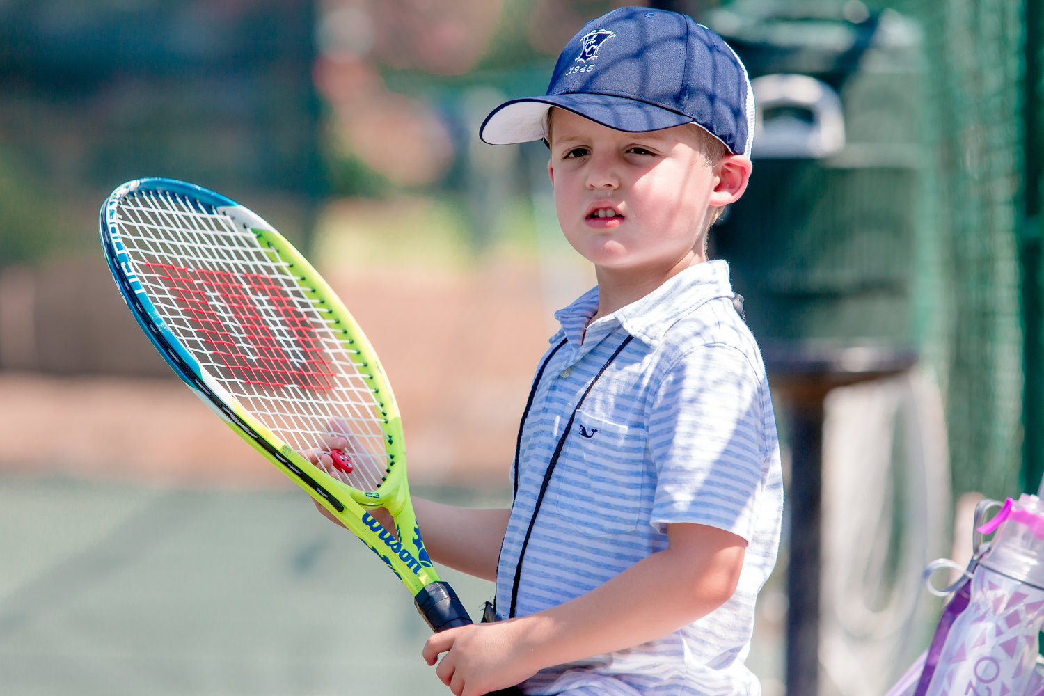 Several summer camps focus on athletics, such as tennis.