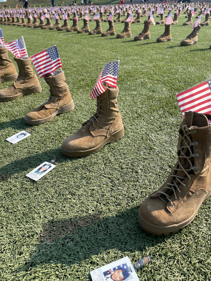 More than 7,000 boots are on display at Hedrick Stadium on Fort Bragg to honor fallen service members. The display will be up until Monday.