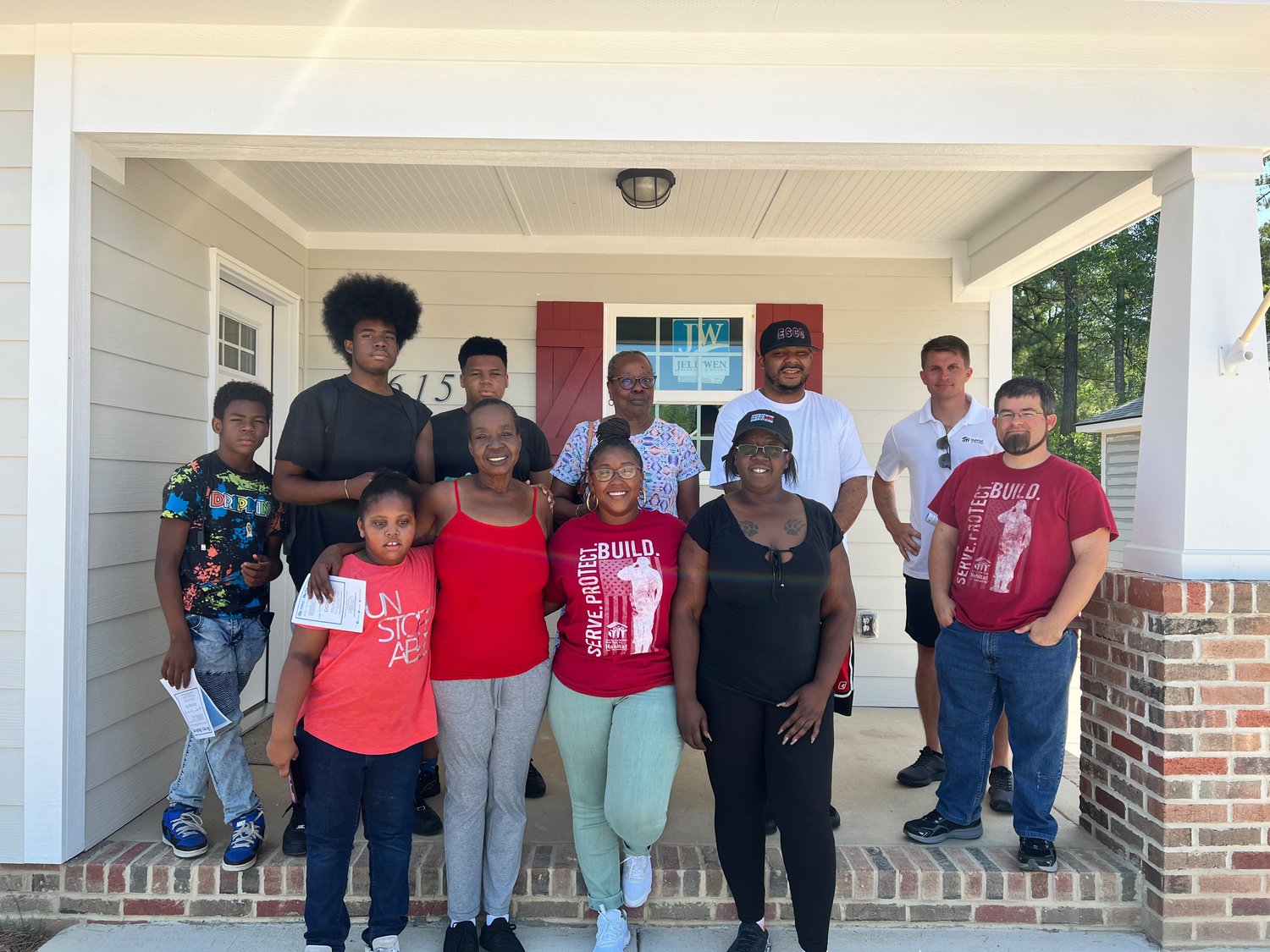 Homeowner Kareemah Evans celebrated her new home in the Oakridge Estate community on Friday. Friday’s ceremony marked the 43rd home built and sold in the past three years in Oakridge Estate.