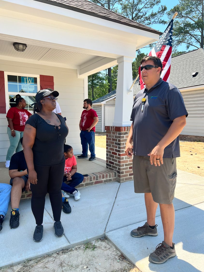 The Fayetteville Area Habitat for Humanity on Friday dedicated a new home in the Oakridge Estate community. Habitat staff and volunteers along with community leaders celebrated the event with homeowner Kareemah Evans.