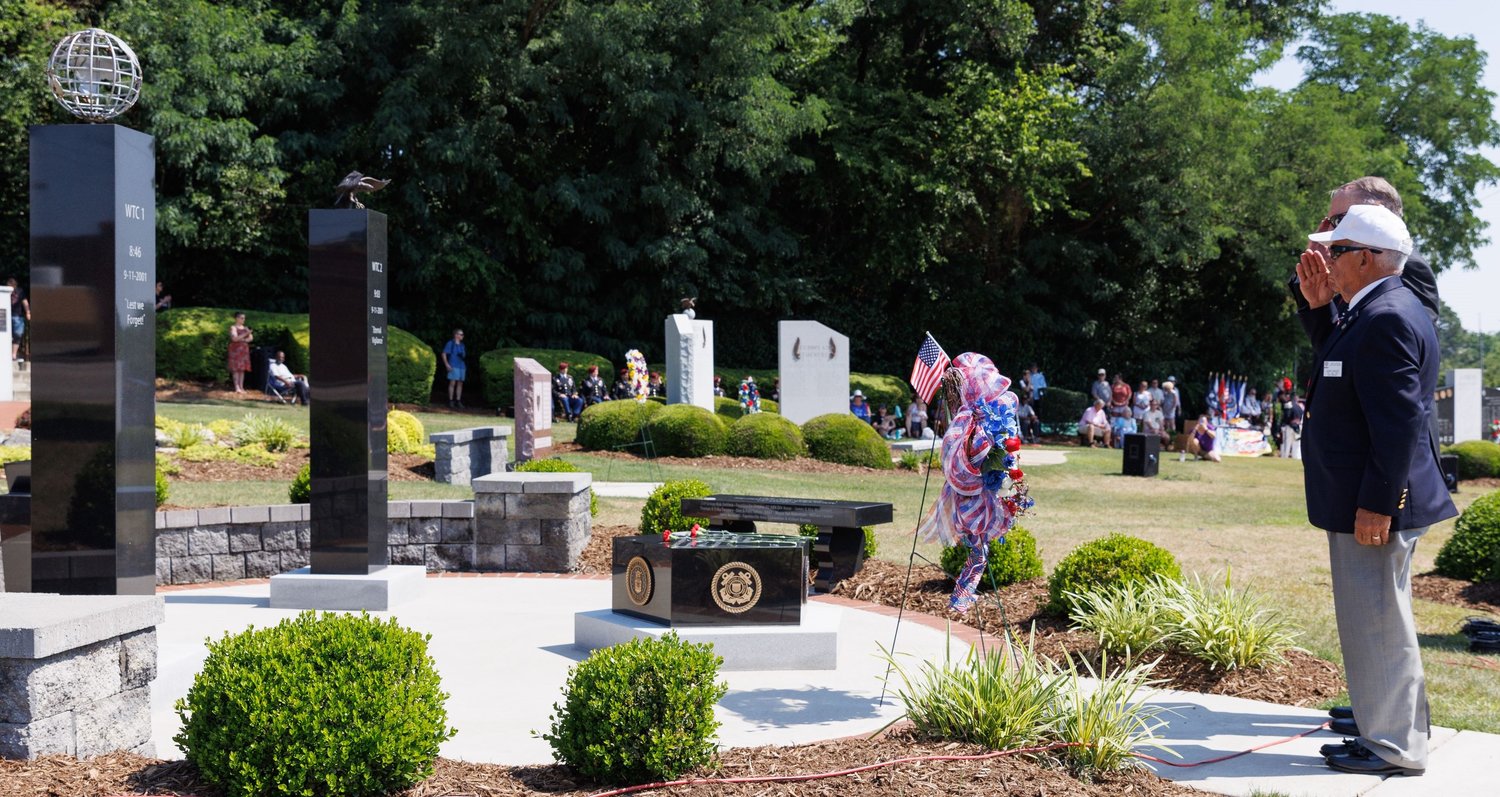 About 300 people attended a Memorial Day service on Monday at Freedom Memorial Park in downtown Fayetteville.