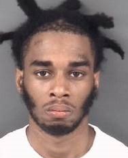 Darius Jovan Clements, 21, is charged with shooting at Fayetteville police officers in the 2000 block of Spokane Road.