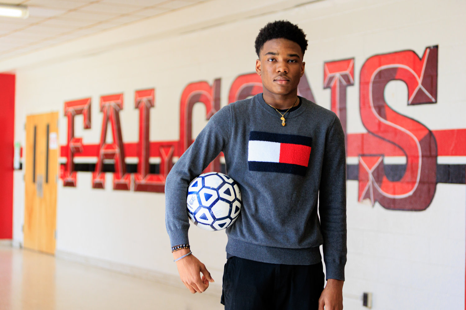 Adejuwon Balogun credits his soccer coach for building his confidence. He graduated from Seventy-First High School this month ranked seventh in his class.