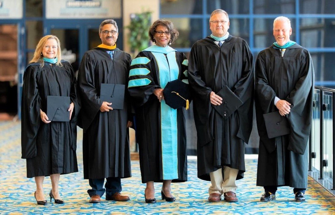 From left: Betty Musselwhite, associate superintendent of school support; Clyde Locklear Jr., associate superintendent of business operations; Mary Black, associate superintendent of student support services; Joe Desormeaux, sssociate superintendent of auxiliary services; and Ron Phipps, associate superintendent of data and accountability. All are retiring from Cumberland County Schools.