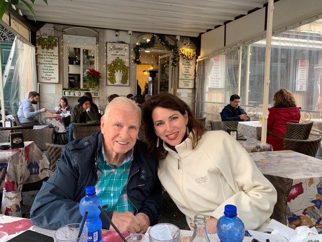 Don Hinton and daughter Sharon Hinton Smith enjoyed being together for lunches. In this photograph, the two were having a Christmas lunch in 2019 at Naval Air Station Sigonella in Sicily, Italy.