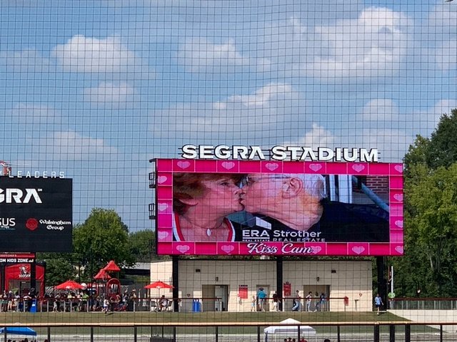 Marie and Don Hinton caught on the Kiss Cam at Segra Stadium.