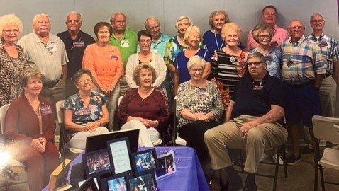 Members of the Hope Mills High School Class of 1967 held their 55th-year reunion in early June. Front row, from left, are Judy Tew, Theresa Sims, Pat Smith, Chris Croft and Larry Childers. Second row, from left, are Brenda Thames, Raymond McLemore, Joyce Crenshaw, Sherry Bowman, Carol McGee, Laura Cope McIntosh, Jean Koonce and Michael Calhoun. Third row, from left, are Doug Watts, Sandy Holland, Glen Biggs, Linda Swanson Lockamy, Sybil West, Maxie Carter and Cliff Edwards. Watts was a teacher and coach at the school. West was a teacher.