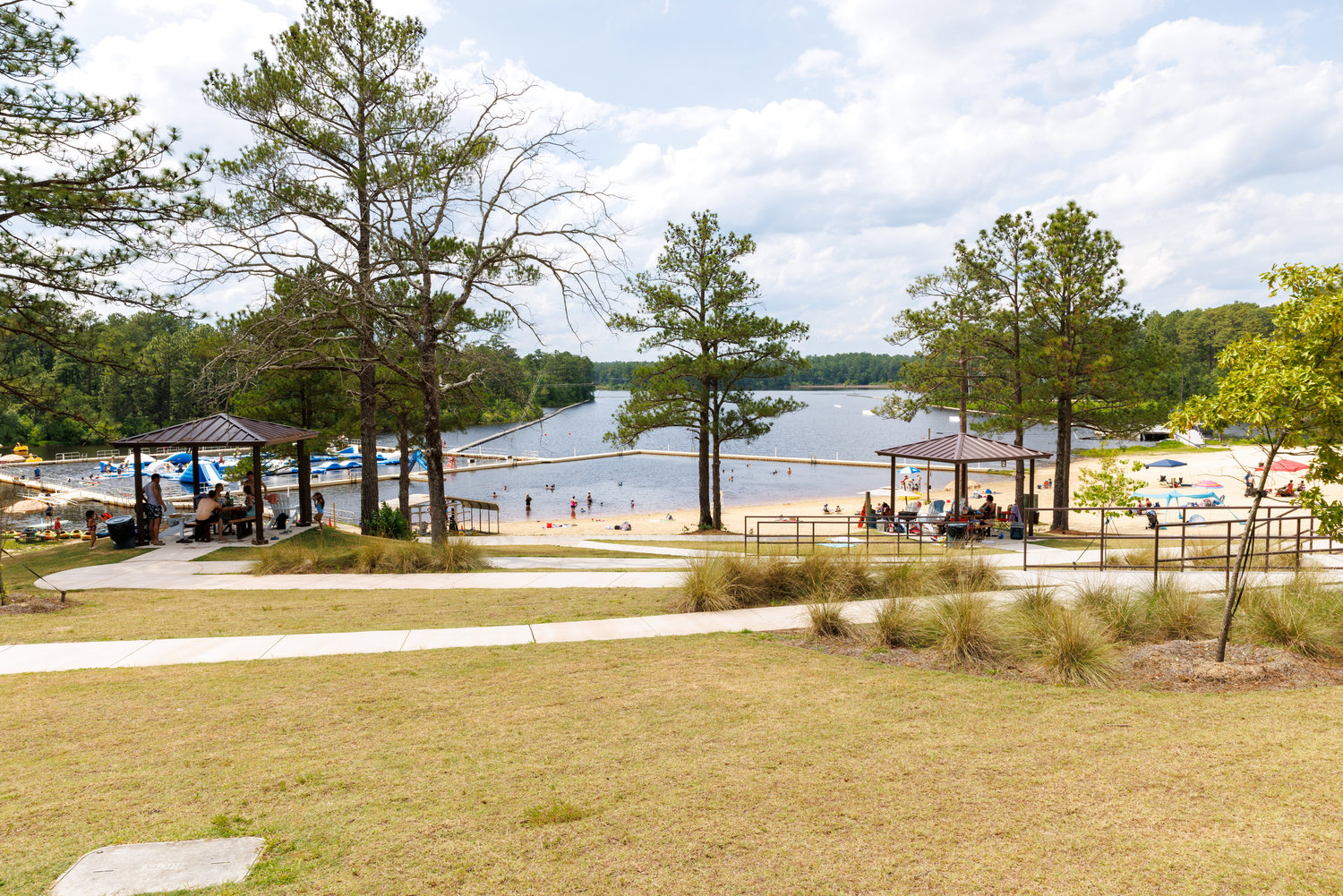 Smith Lake has a swimming area and water activities, including an inflatable in-water obstacle course.