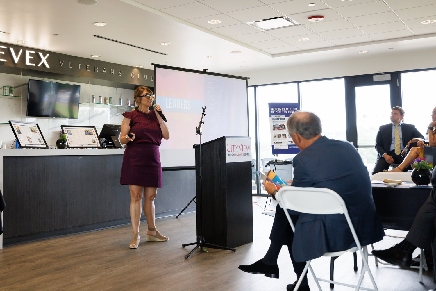 Bianca Shoneman, president and CEO of the Cool Spring Downtown District, provides an update on projects and events in the downtown area during the 2022 CityView Downtown Visionaries Luncheon Wednesday at Segra Stadium.