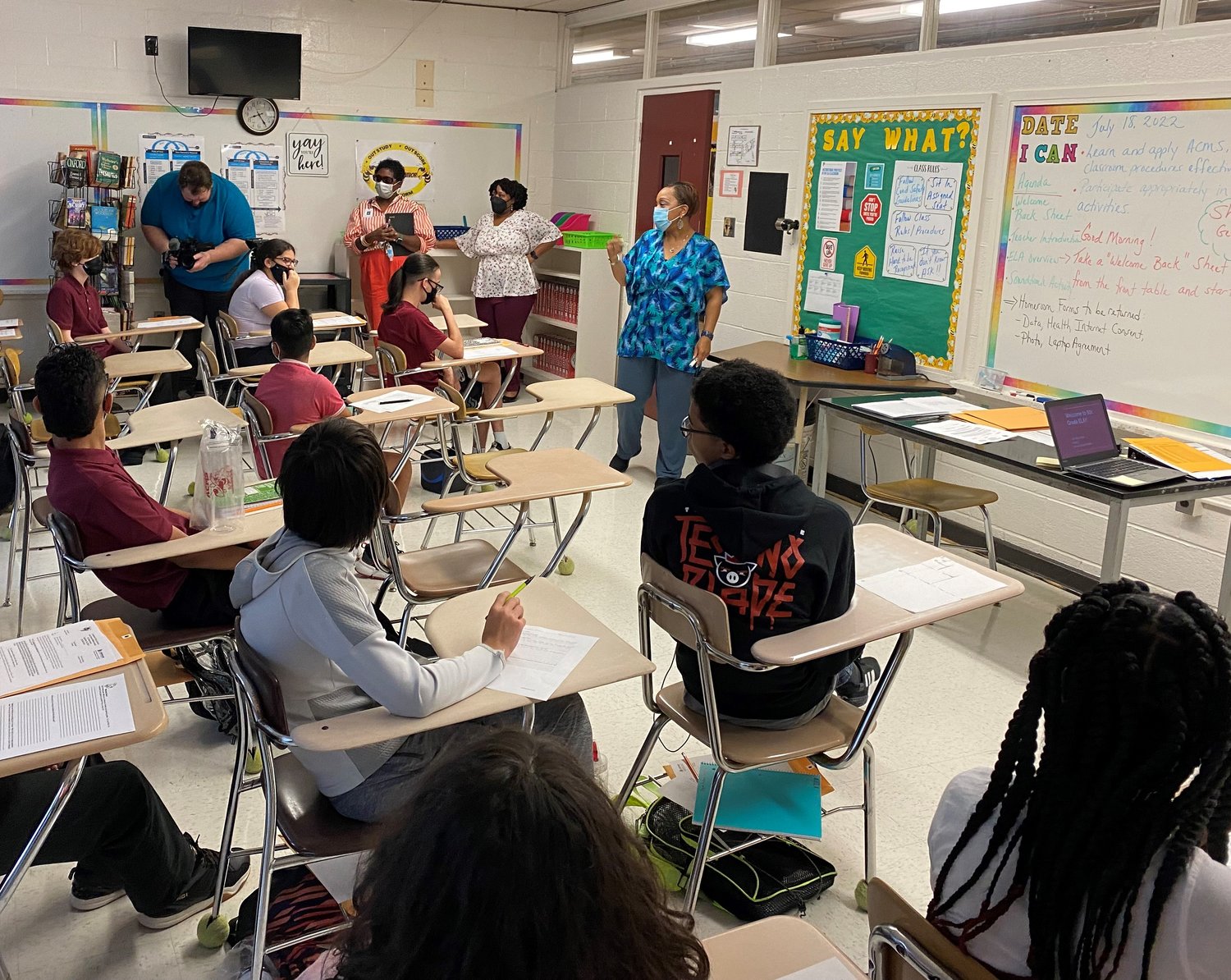 English-language arts teacher Misty Pride begins the new school year with eighth-grade students at Anne Chesnutt Middle School on Monday.