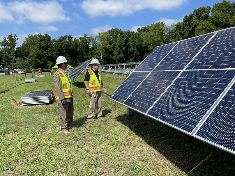 Dr. Mark Sorrells, left, senior vice president of academic and student services at Fayetteville Technical Community College, views a demonstration of a solar array at Blue Ridge Power in Fayetteville on Wednesday.