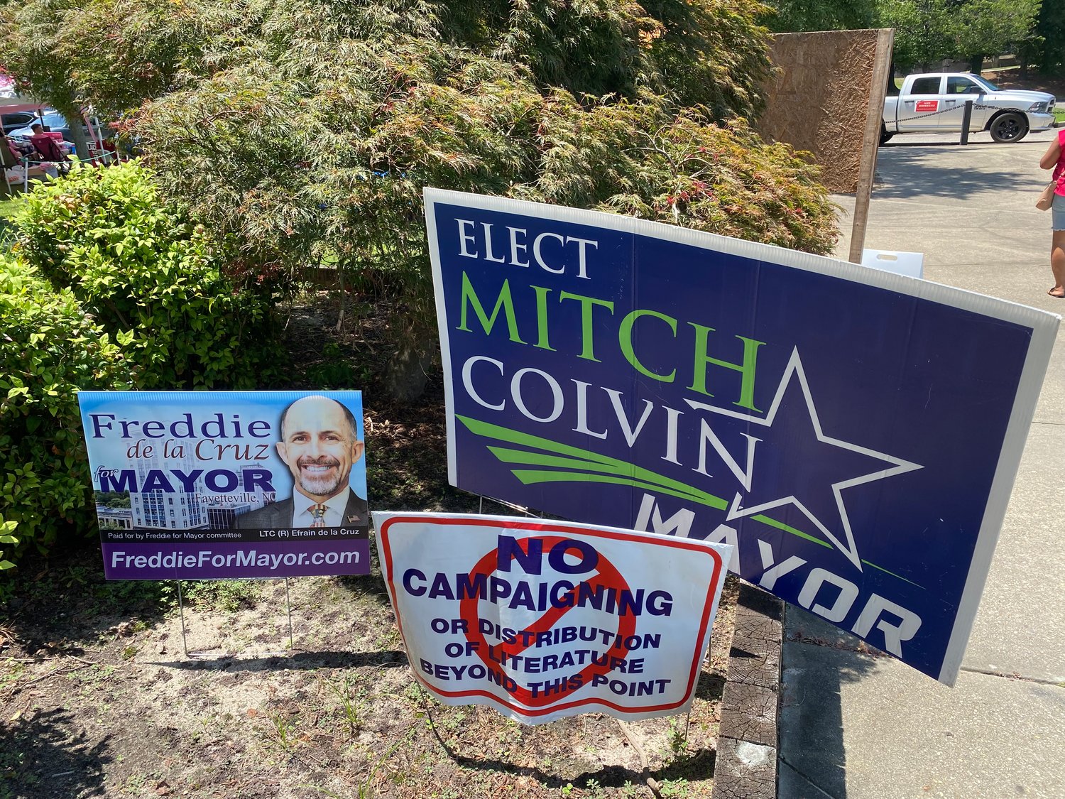 Campaign signs were posted outside the Board of Elections on the last day of early voting. The Fayetteville municipal election is Tuesday.
