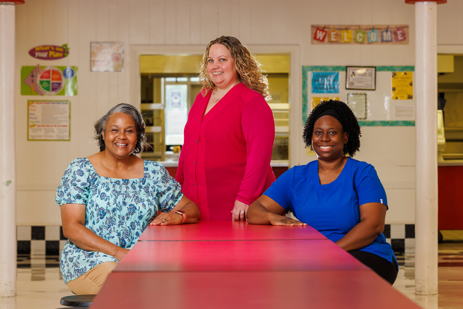 From left, Teresa Huff, Amanda Mooney and Tracy Smith, child nutrition managers for Cumberland County Schools, say it’s important to connect with students while encouraging them to eat a healthy diet.
