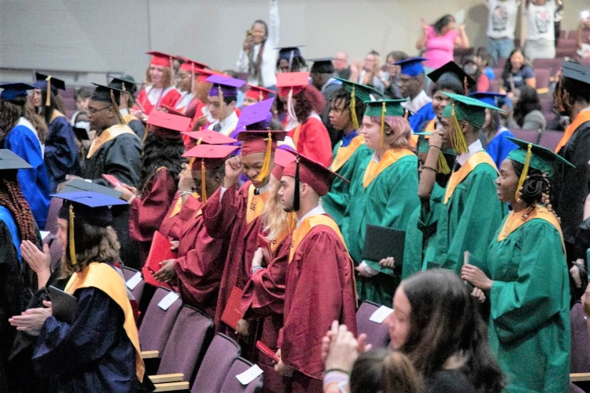 Cumberland County Schools' 2022 summer graduates celebrate after the turning of the tassels on Thursday at Jack Britt High School.
