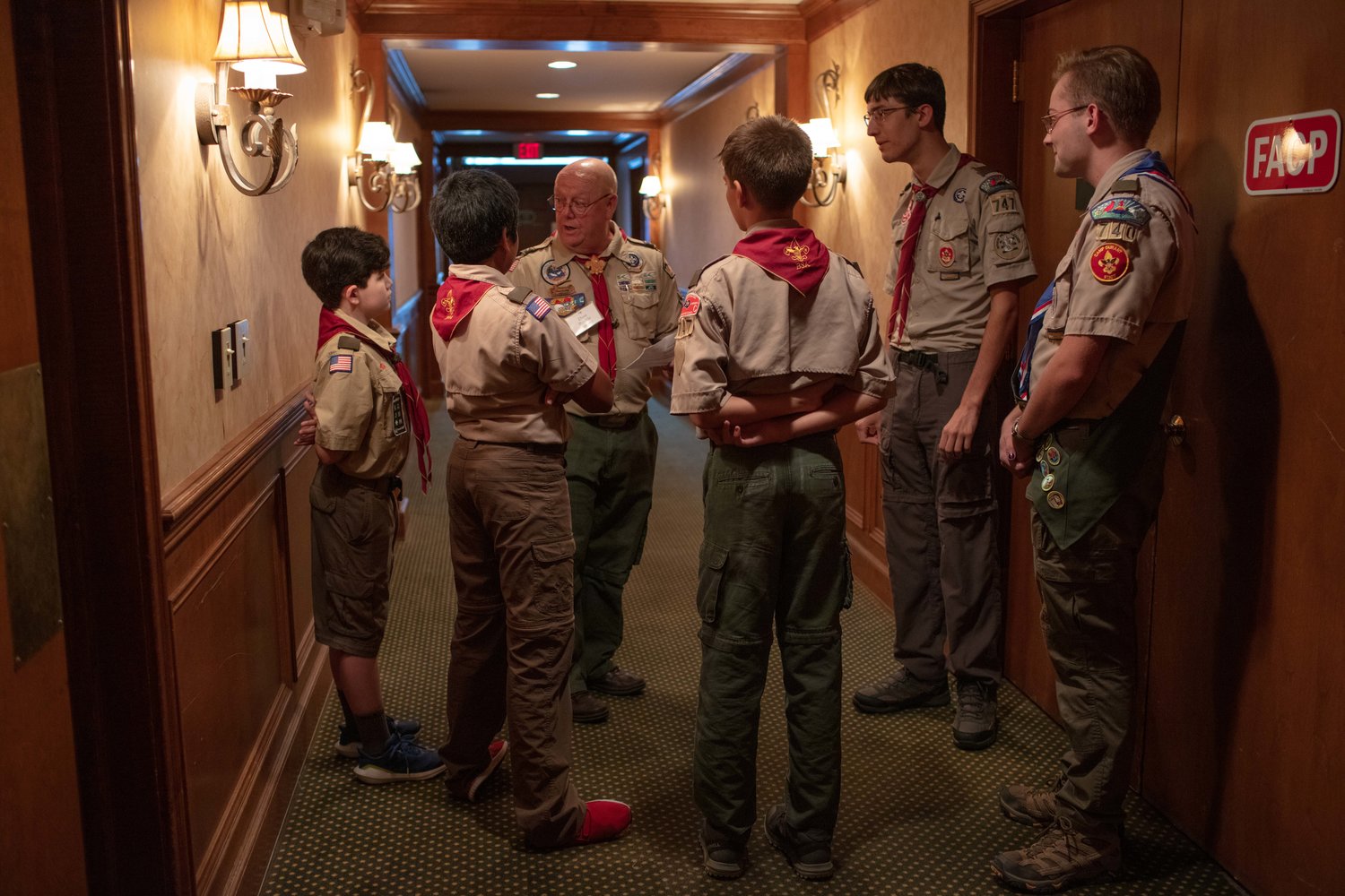 A few select Boy Scouts go over their responsibilities before the start of the Cumberland County Boy Scouts of America Occoneechee Council’s annual Distinguished Citizen Award Dinner on Aug. 18, 2022, at Highland Country Club.