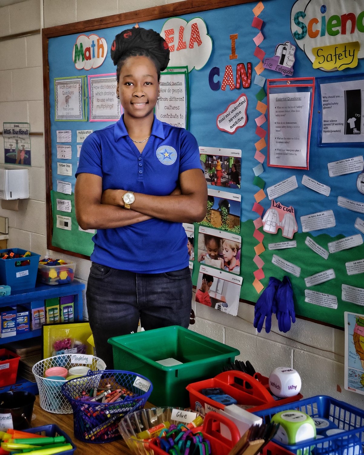 Danielle Wynter, a teacher at Ferguson-Easley Elementary School, with her third-grade teaching materials. 'I love teaching and the joys it brings me,'' she says.