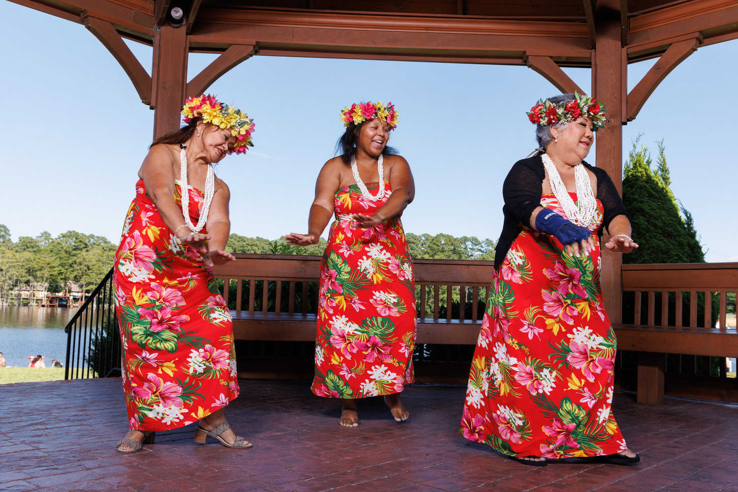 Kui Rivera, right, the founder of Aloha Ka’naka O Hula Halau, has taught hundreds of dancers over the years. Among them are, from left, Cecille Guerrero and Syreeta Jackson. The dance troupe is scheduled to perform at this month’s International Folk Festival.
