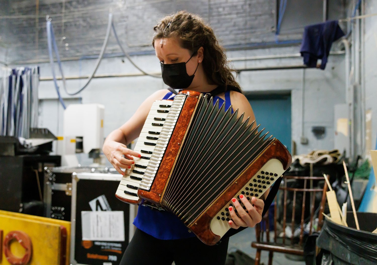 Amber Dawn French plays the accordion as the cast of Cape Fear Regional Theatre's "Buddy: The Buddy Holly Story" rehearses.