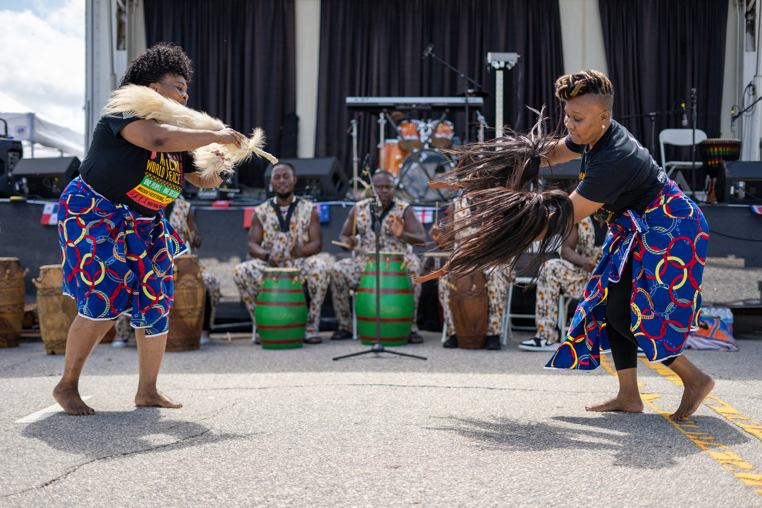 The Aya African Drum and Dance group performs.