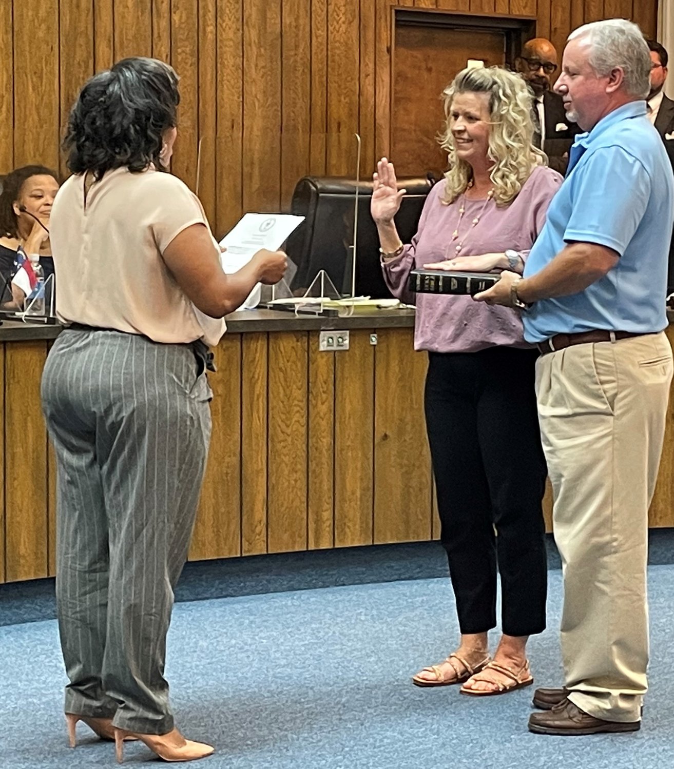 Spring Lake Mayor Kia Anthony administers the oath of office to Patricia Hickman, who was sworn in as the interim town clerk on Monday night.