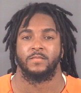 Lamarious Brown, 25, was sentenced Tuesday in District Court after police said they found heroin, cocaine and firearms in a vehicle parked outside a Bragg Boulevard nightclub in January 2018.