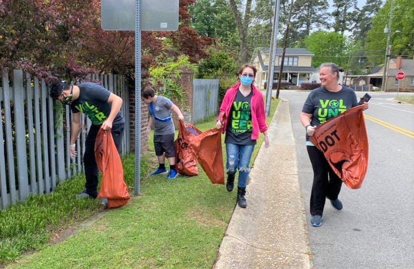 Volunteers pick up litter during a previous Fayetteville Beautiful litter cleanup campaign.
