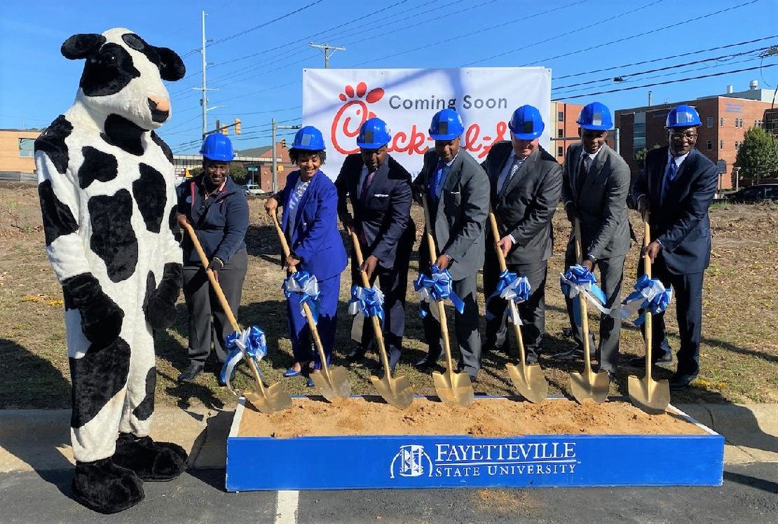Fayetteville State University Chancellor Darrell T. Allison, Fayetteville Mayor Mitch Colvin and other officials break ground for a Chick-fil-A that will be built in the renamed Bronco Midtown business center.