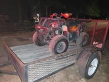 The Sheriff’s Office said it seized two trailers, two ATVs, stolen license plates, military surplus, a stolen firearm and narcotics during a search of a property on Smokey Canyon Drive on Saturday.
