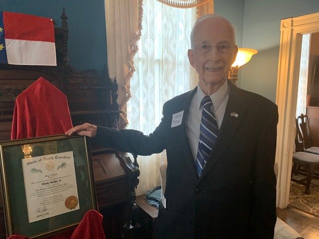 Weeks Parker Jr. was honored Saturday with the Order of the Long Leaf Pine at the Sanford House of the Heritage Square Historical Society.