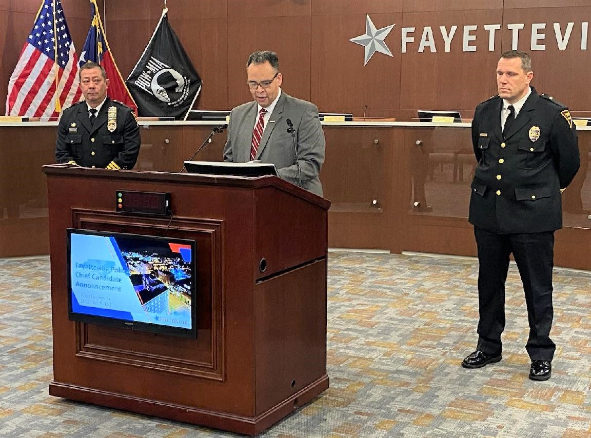City Manager Doug Hewett announces that Fayetteville Assistant Chiefs Kemberle Braden, left, and James Nolette, right, are the two finalists to become the city's next police chief.