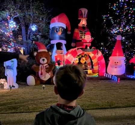 Inflated characters light up at the Kells family Christmas display.