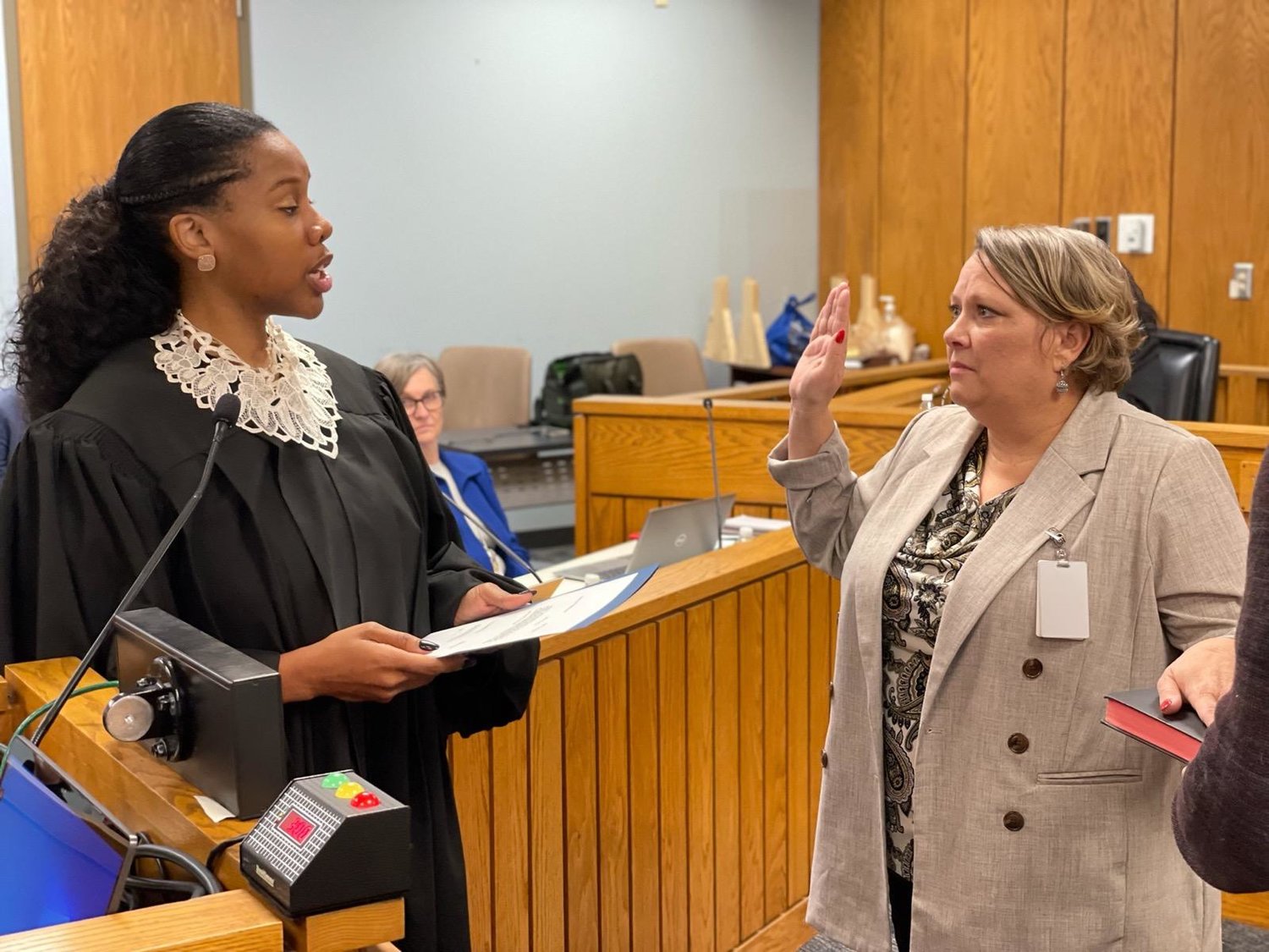 District Court Judge Tiffany Whitfield administers the oath of office to Cumberland County Clerk to the Board Andrea Tebbe. The Board of Commissioners appointed Tebbe, who previously served as deputy clerk to the board, as clerk effective Dec. 1 following the retirement of former Clerk Candice White.