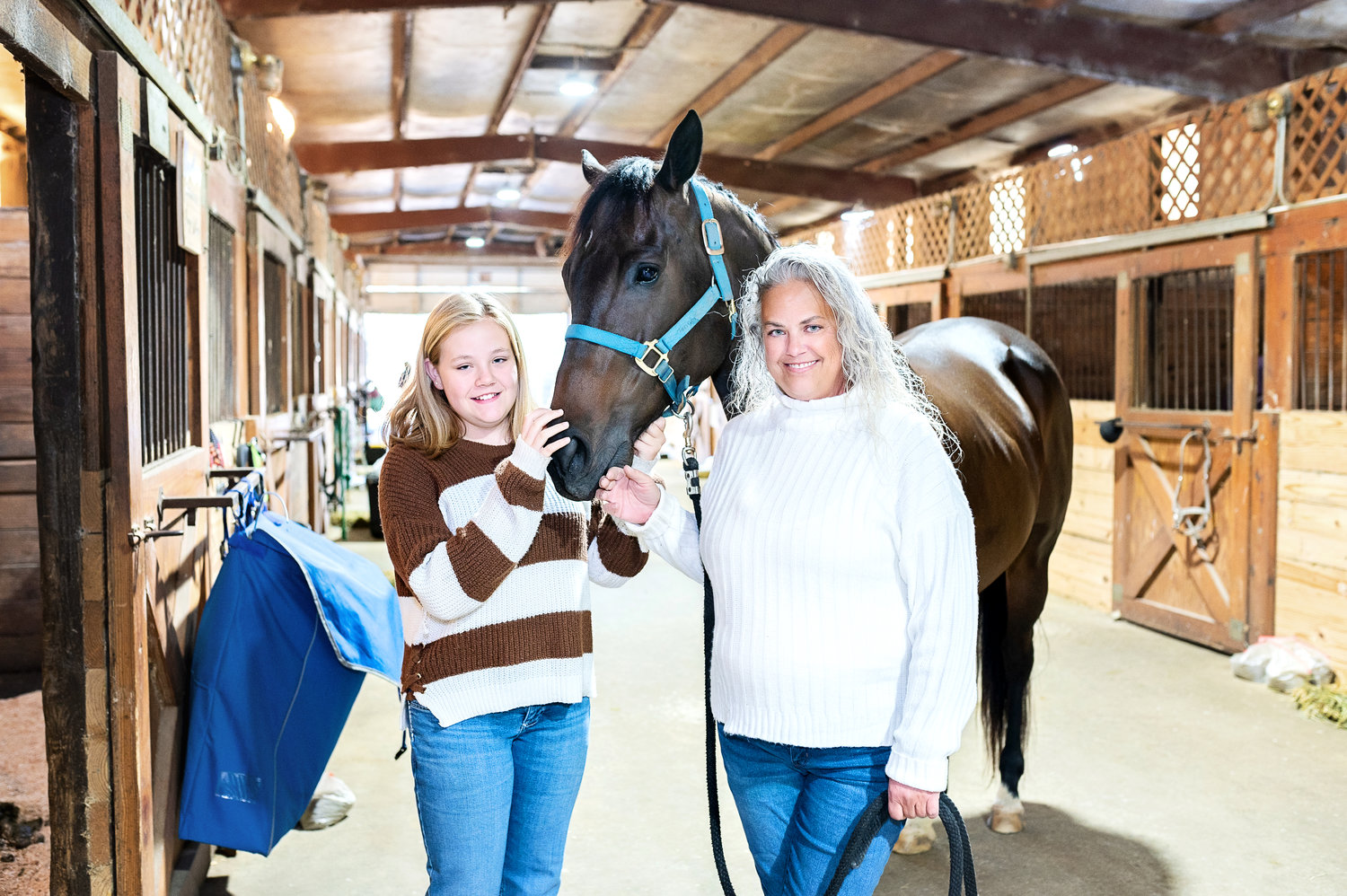 Kristin Wilkey shares her love of horses with her daughter Payge.