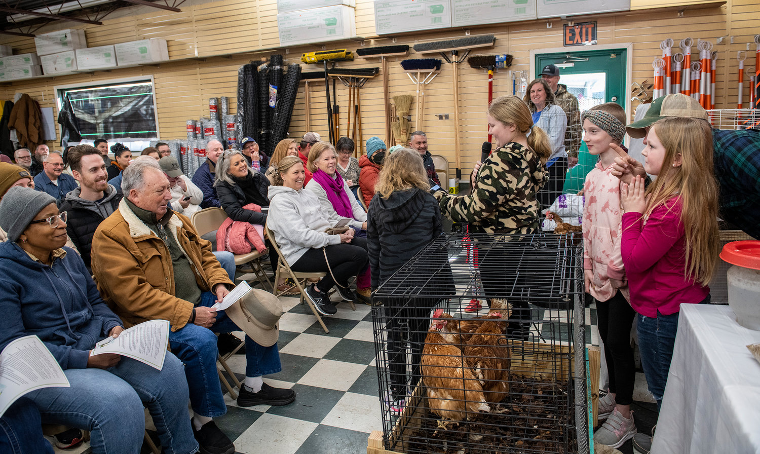The Dodson and Brattin children started the how-to seminar by telling funny Cluck Cluck Cluck! jokes at Bell’s Seed Store.