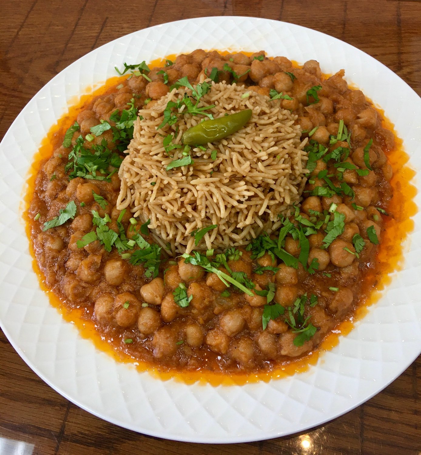 Afghan Kabob’s chickpeas in a special tomato sauce with Afghan rice makes for a satisfying meal.