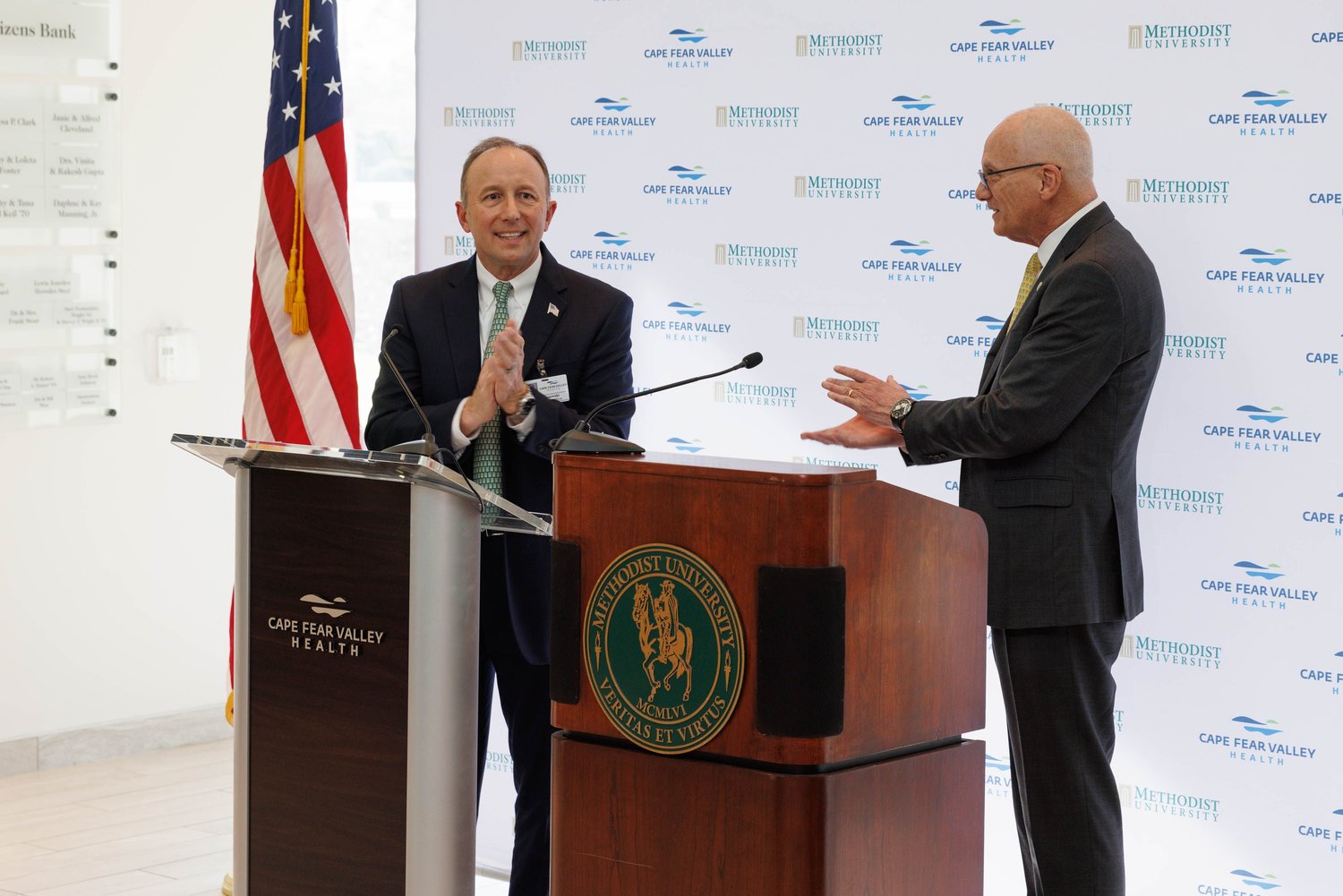 Mike Nagowski, left, CEO of Cape Fear Valley Health, and Methodist University President Stanley T. Wearden address a news conference Monday to announce plans to partner on opening a medical school.