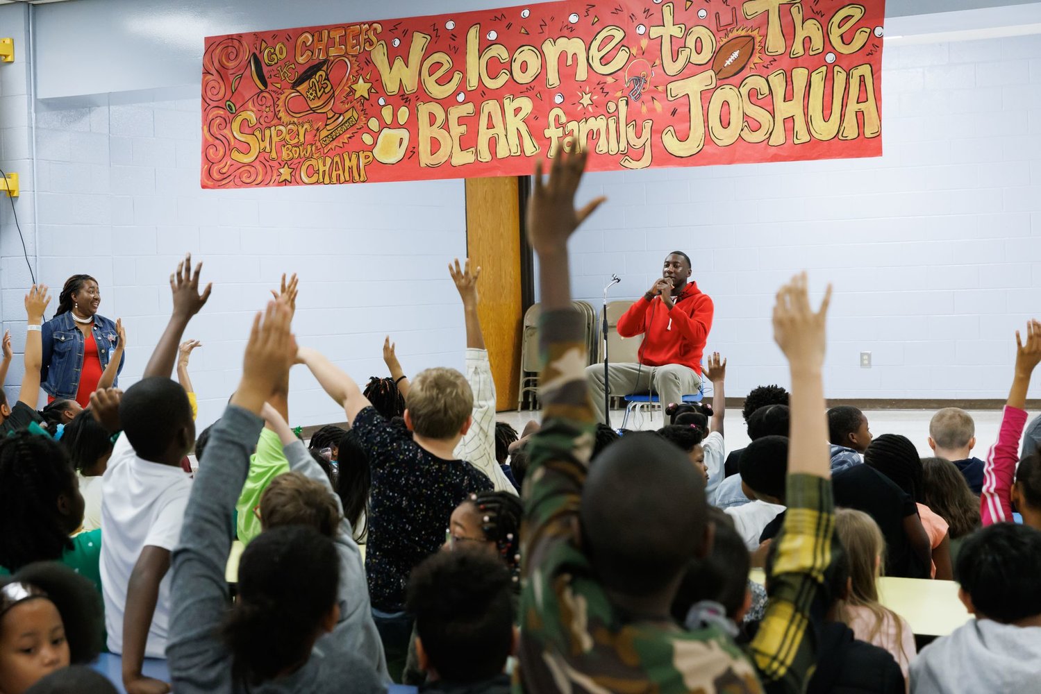Super Bowl champion and Fayetteville native Joshua Williams was welcomed at Loyd Auman Elementary School on Thursday. Williams read aloud to the children and encouraged them to follow their dreams.