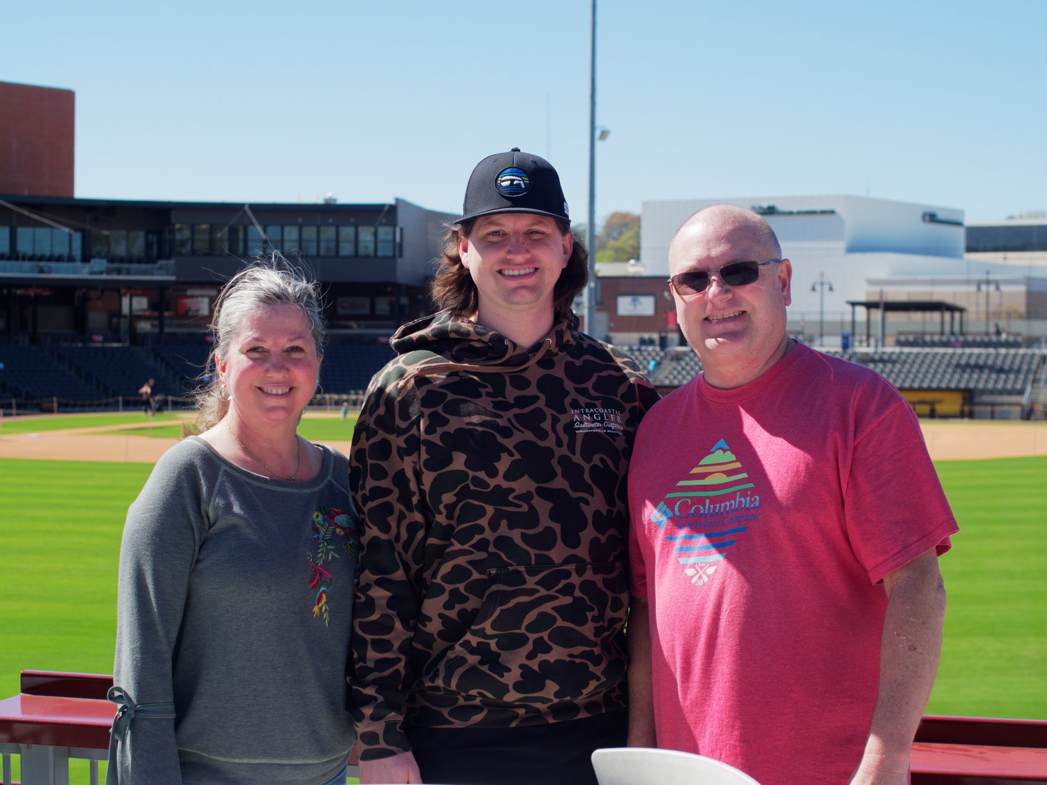 Michelle Gregory, Clint Gregory and Travis Gregory enjoy Spring Fling at Segra Stadium on March 4, 2023.