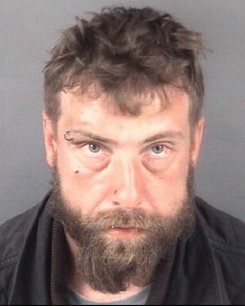Christopher Walker, 38, is charged with going armed to the terror of the public and breaking and entering of a motor vehicle.