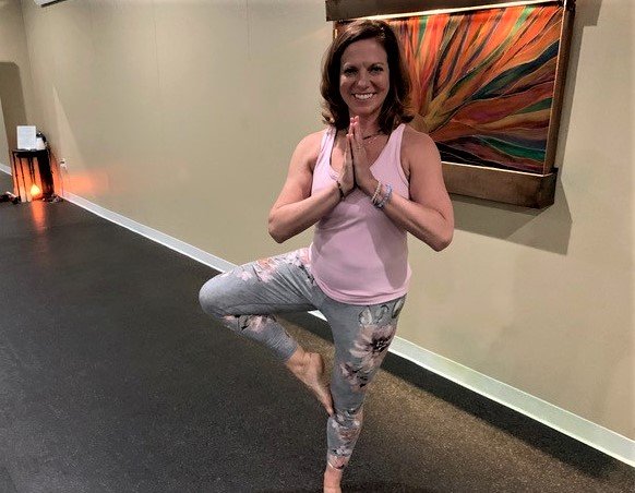 Angie Toman says her clients can take yoga classes in the 'hot studio' at 102 degrees. Toman says the muscles stretch more easily in the warmth.